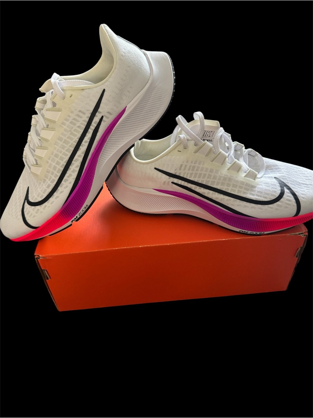 Nike Women's White Running Shoes with Pink and Black Accents